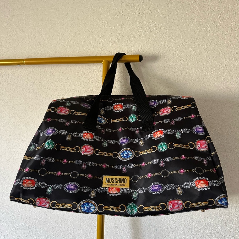 Moschino Fragrances Weekender Monogram Multicolor Travel Duffle Bag
